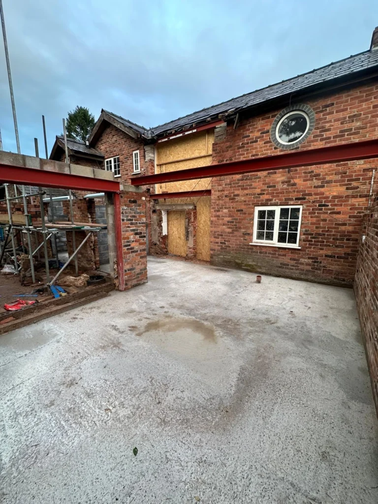 Structural steelwork and a new concrete floor during renovation